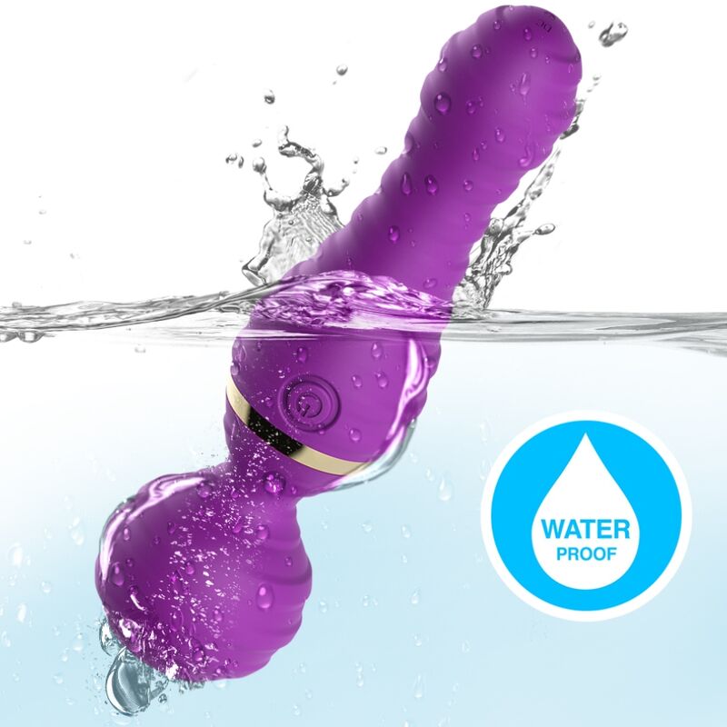 Vibromasseur wand Freedo Armony violet plongé dans l'eau, pictogramme waterproof